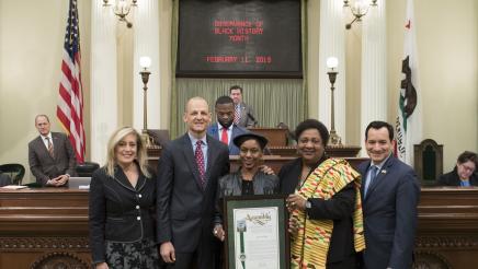 Assemblymember McCarty and Alexandria White being honored at a CLBC Unsung Hero